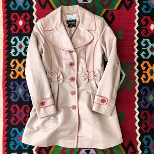 Adorable Kensie trench with bows and pink piping. Like new.
